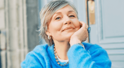 Dysport wrinkle treatment shown on a mature woman with smooth skin and a relaxed, confident expression.
