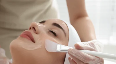 Woman receiving a rejuvenating facial, possibly as part of the best skin tightening treatment.