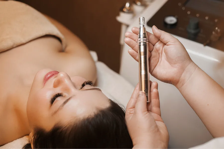 Radiofrequency microneedling handpiece on skin